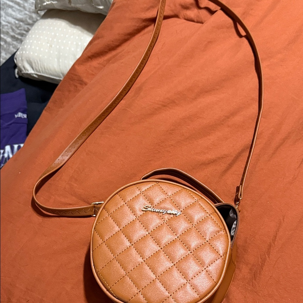 Brown Quilted Crossbody Bag by [Brand]
